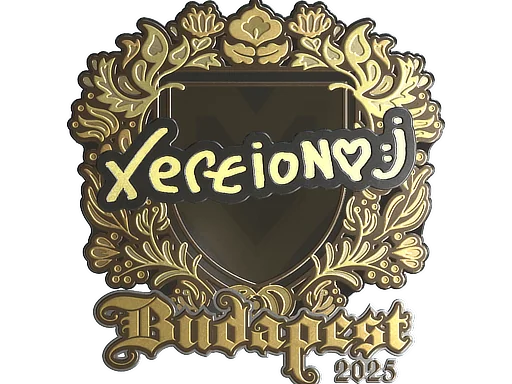 Klistermärke | xertioN (guld) | Budapest 2025